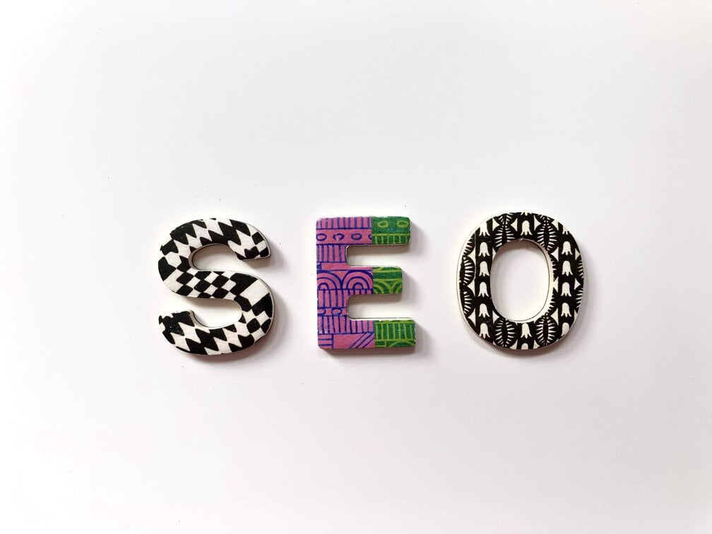 SEO letters on a white surface